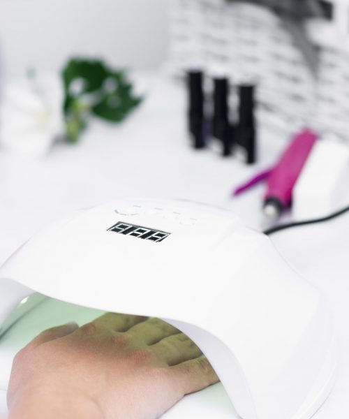 woman-waiting-her-nails-be-done